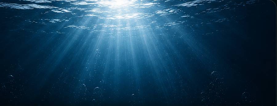 Sunlight rays underwater in the deep ocean